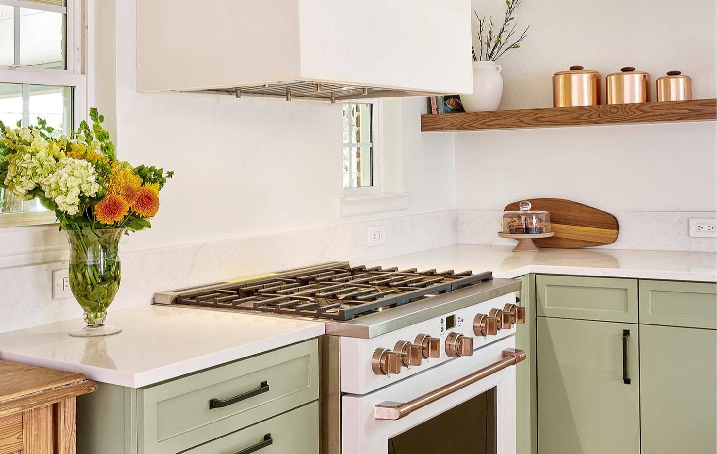 Custom white range hood and green cabinetry in Sardone | McLain kitchen remodel, Dallas, TX