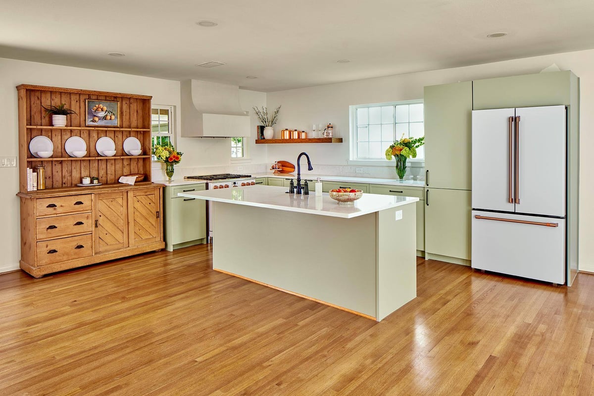 Kitchen remodel with wooden floors and custom cabinetry by Sardone | McLain in Dallas, TX