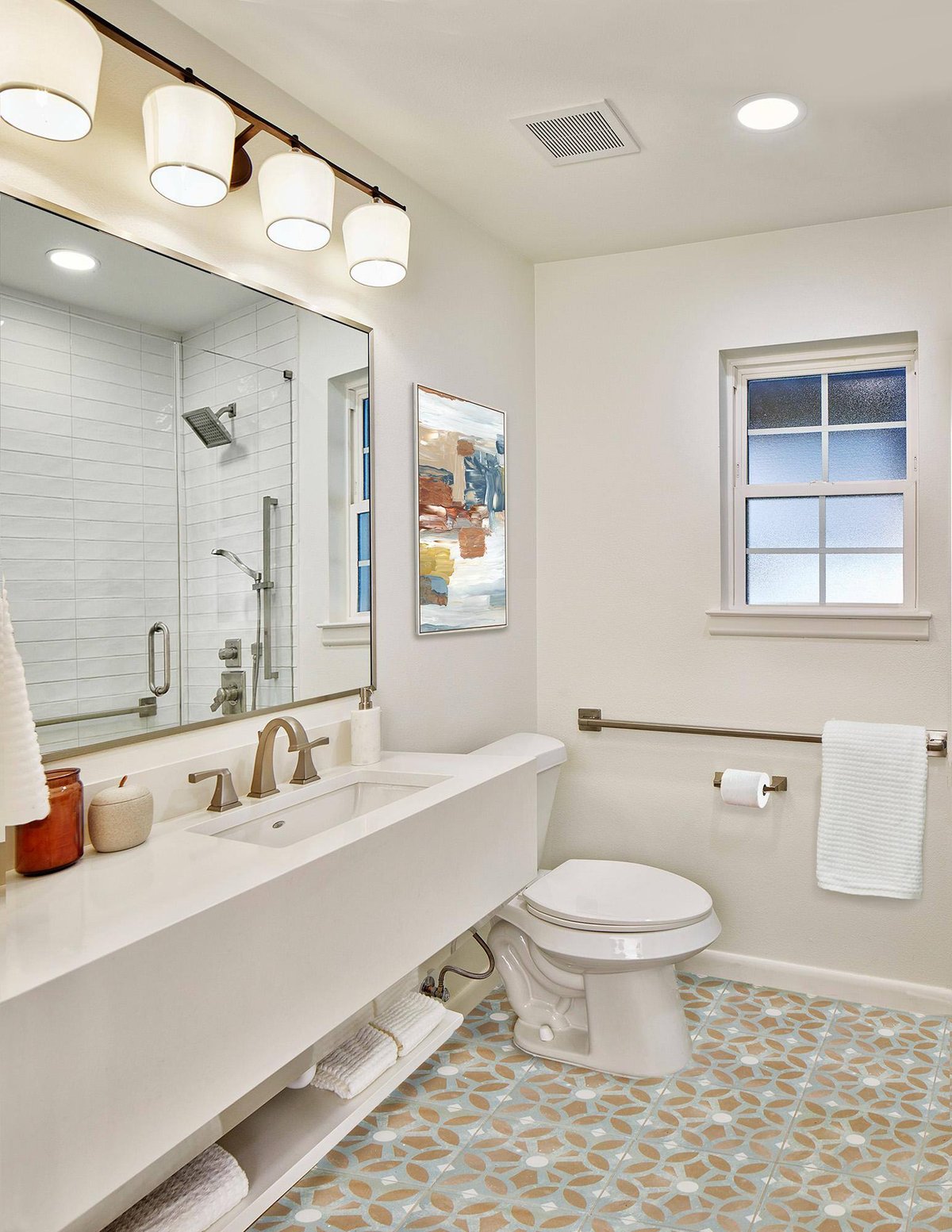 Modern bathroom remodel with floating vanity and lighting in Dallas by Sardone | McLain