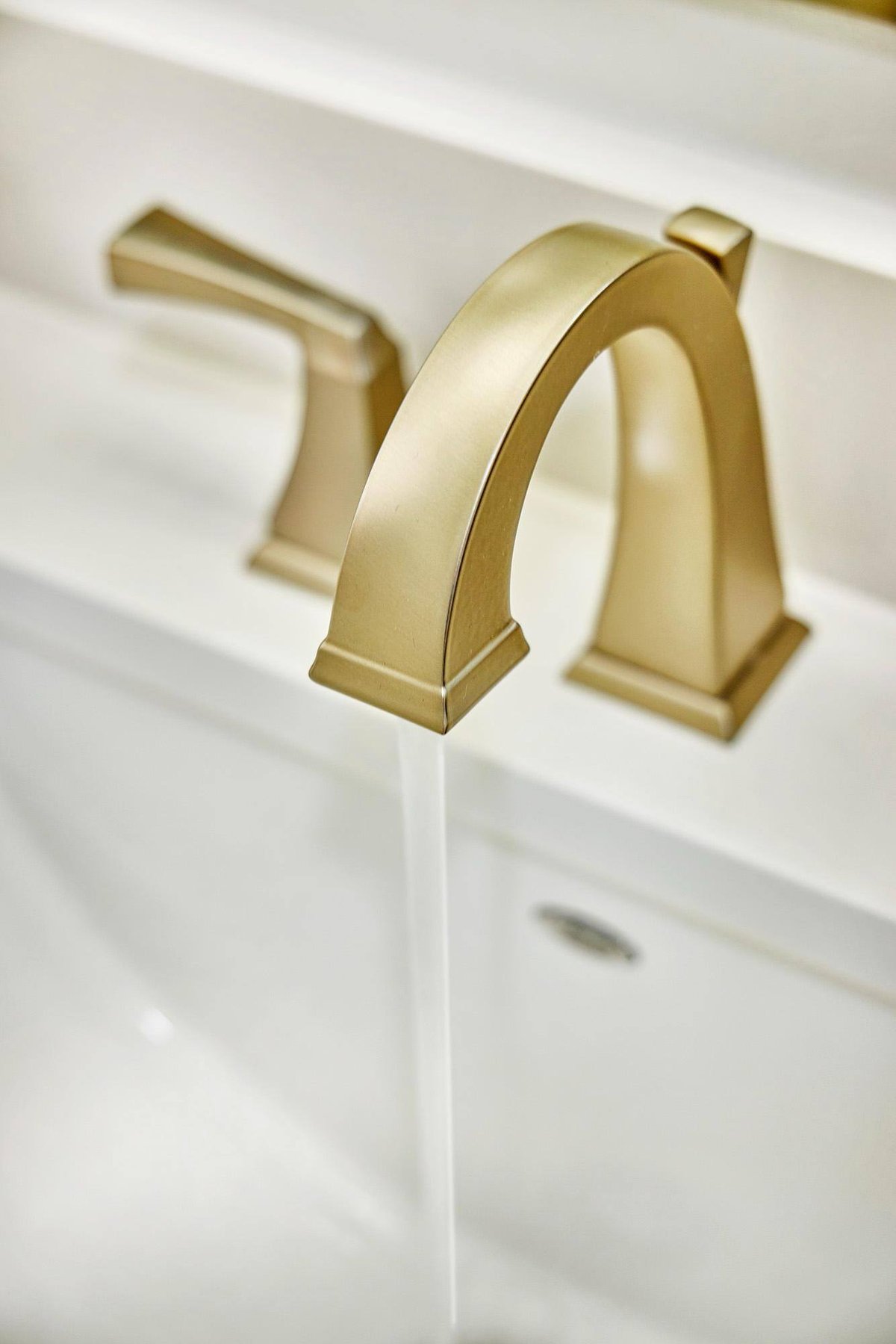 Modern brass faucet in Sardone | McLain bathroom remodel in Dallas, TX