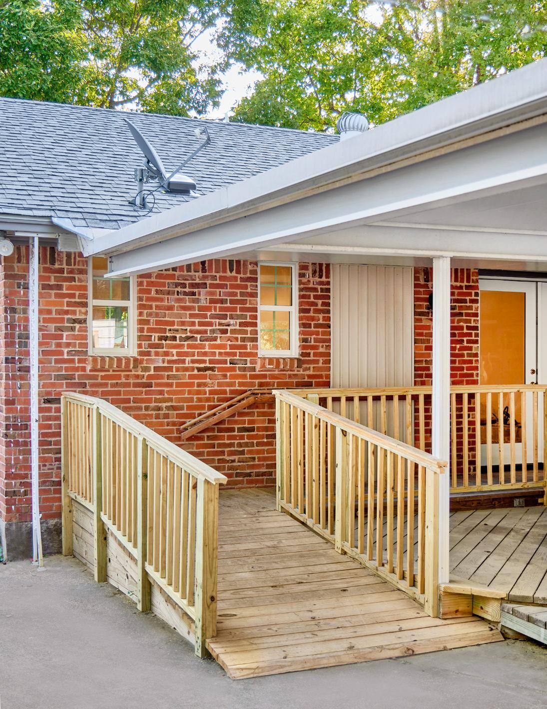 Outdoor wooden ramp installed by Sardone | McLain in a home remodel in Dallas, TX