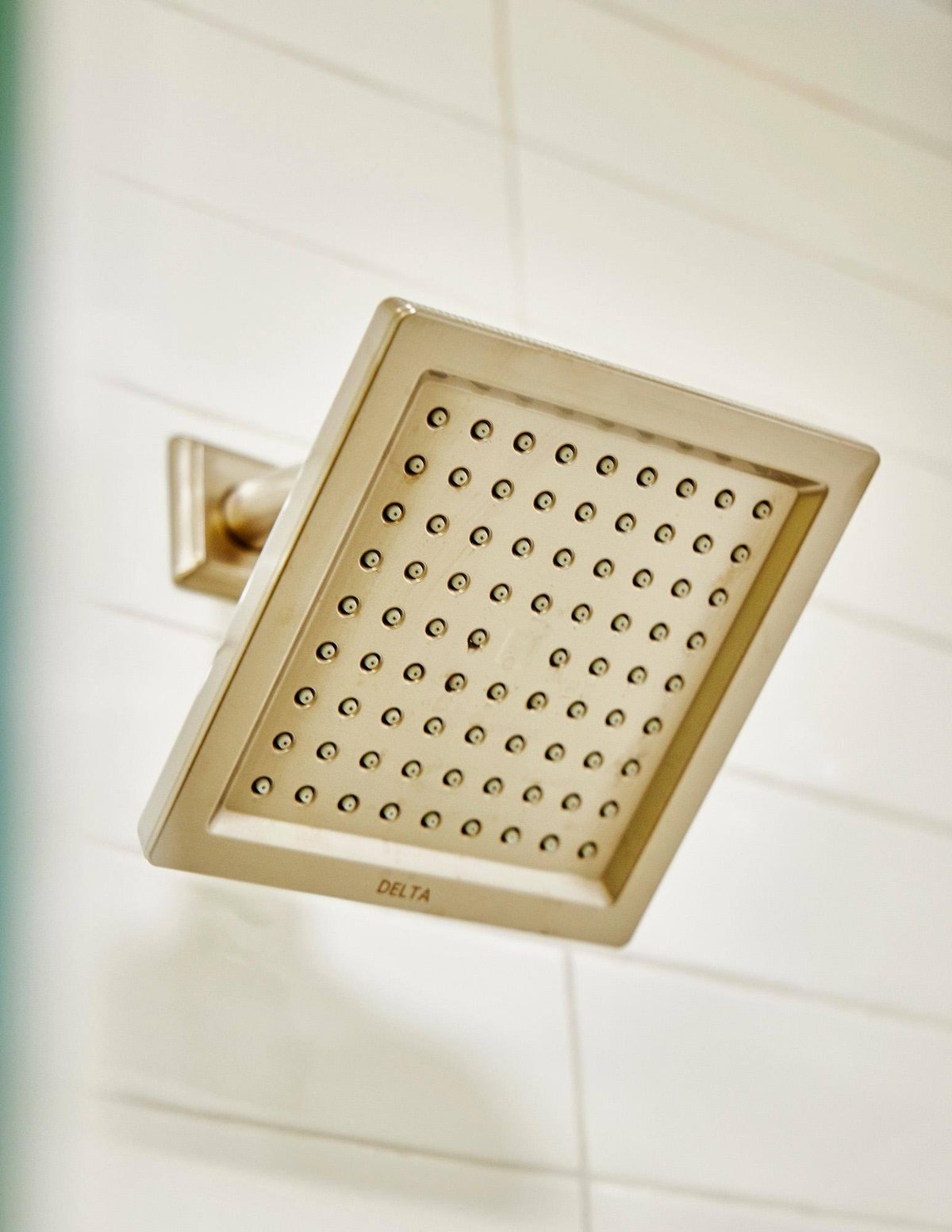 Square rain showerhead in Sardone | McLain bathroom remodel in Dallas, TX