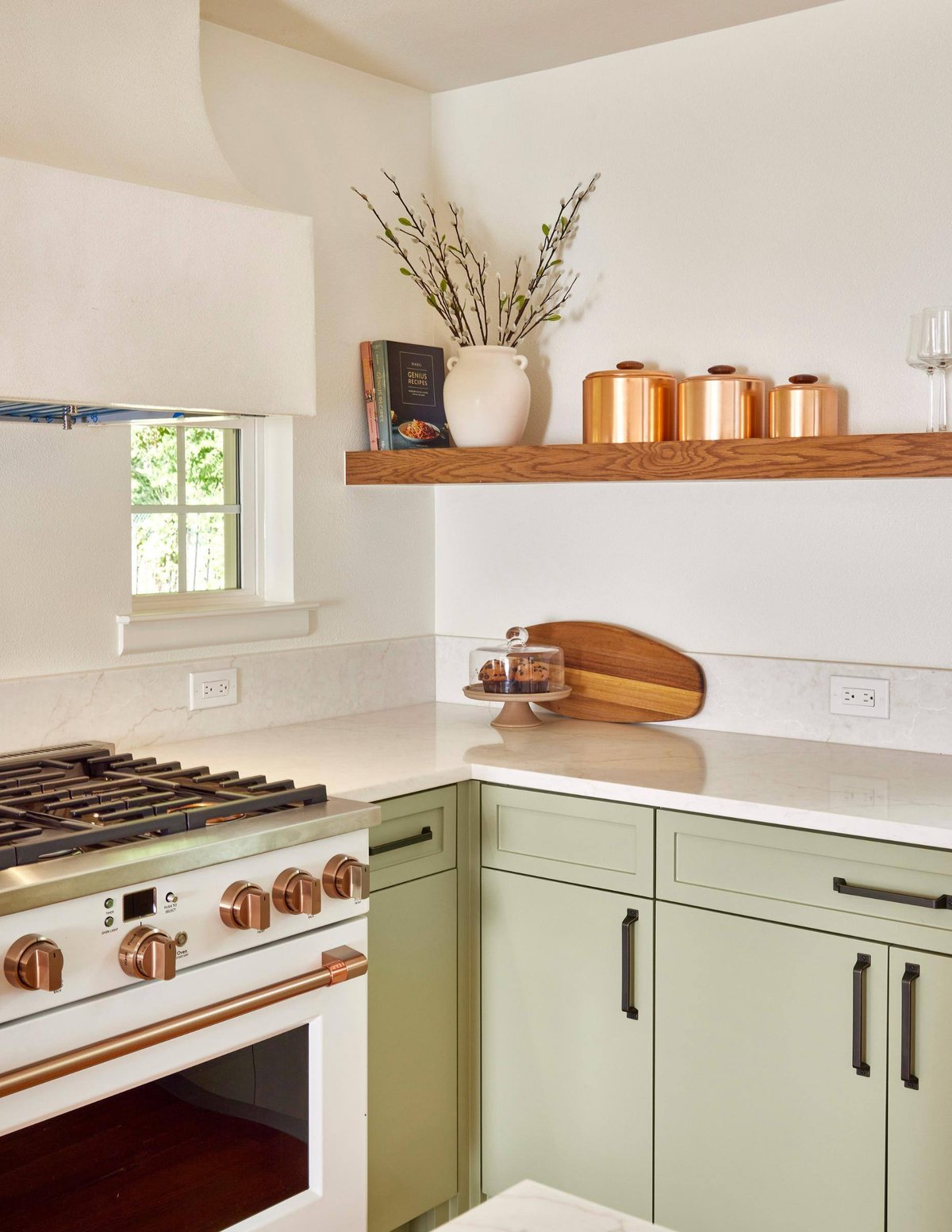 Stove and countertop in Sardone | McLain two-tone kitchen renovation, Dallas