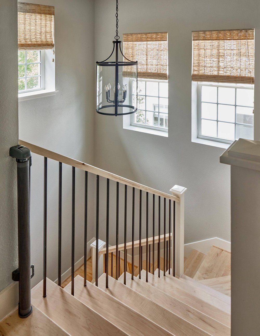 Curved staircase to second story addition in Dallas home remodel by Sardone | McLain