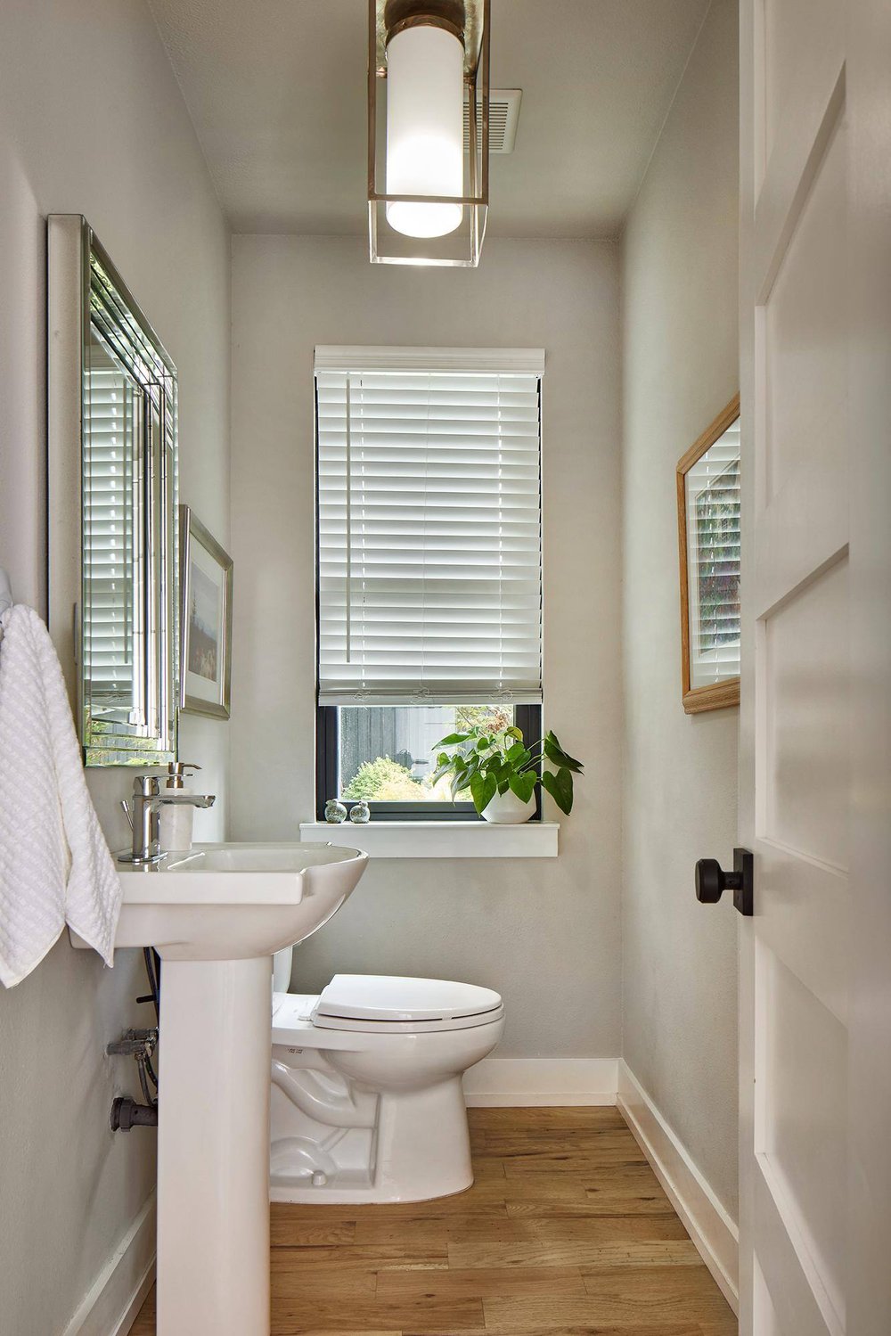 Powder bathroom in Dallas home remodel by Sardone | McLain in Dallas, TX