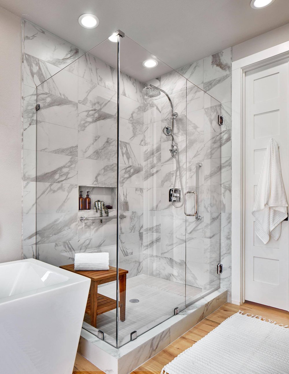 Walk-in shower with inset shelf in Dallas home remodel by Sardone | McLain in Dallas, TX