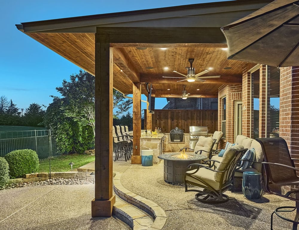 Ceiling fans in covered outdoor living space remodel with kitchen by Sardone | McLain