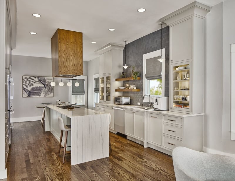 High-end kitchen remodel in Dallas with kitchen island by Sardone | McLain
