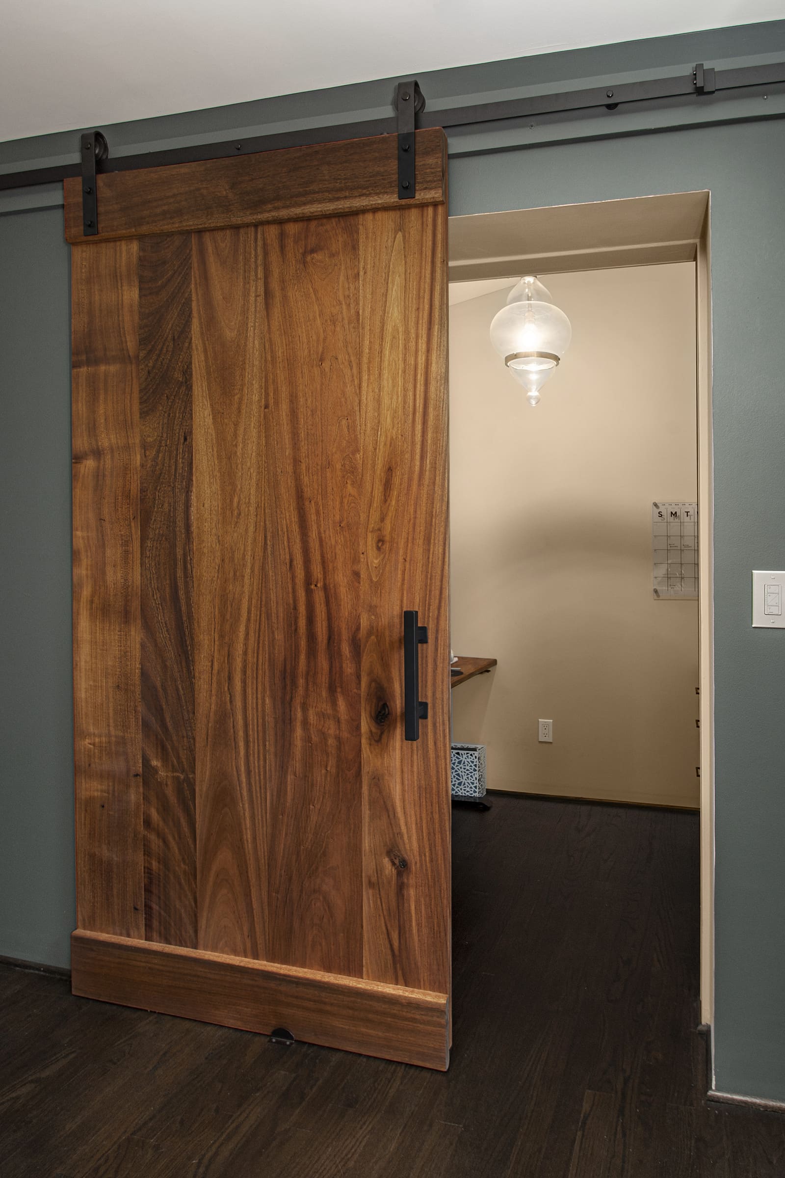 Farmhouse-style door in home remodel in Dallas, TX by Sardone | McLain