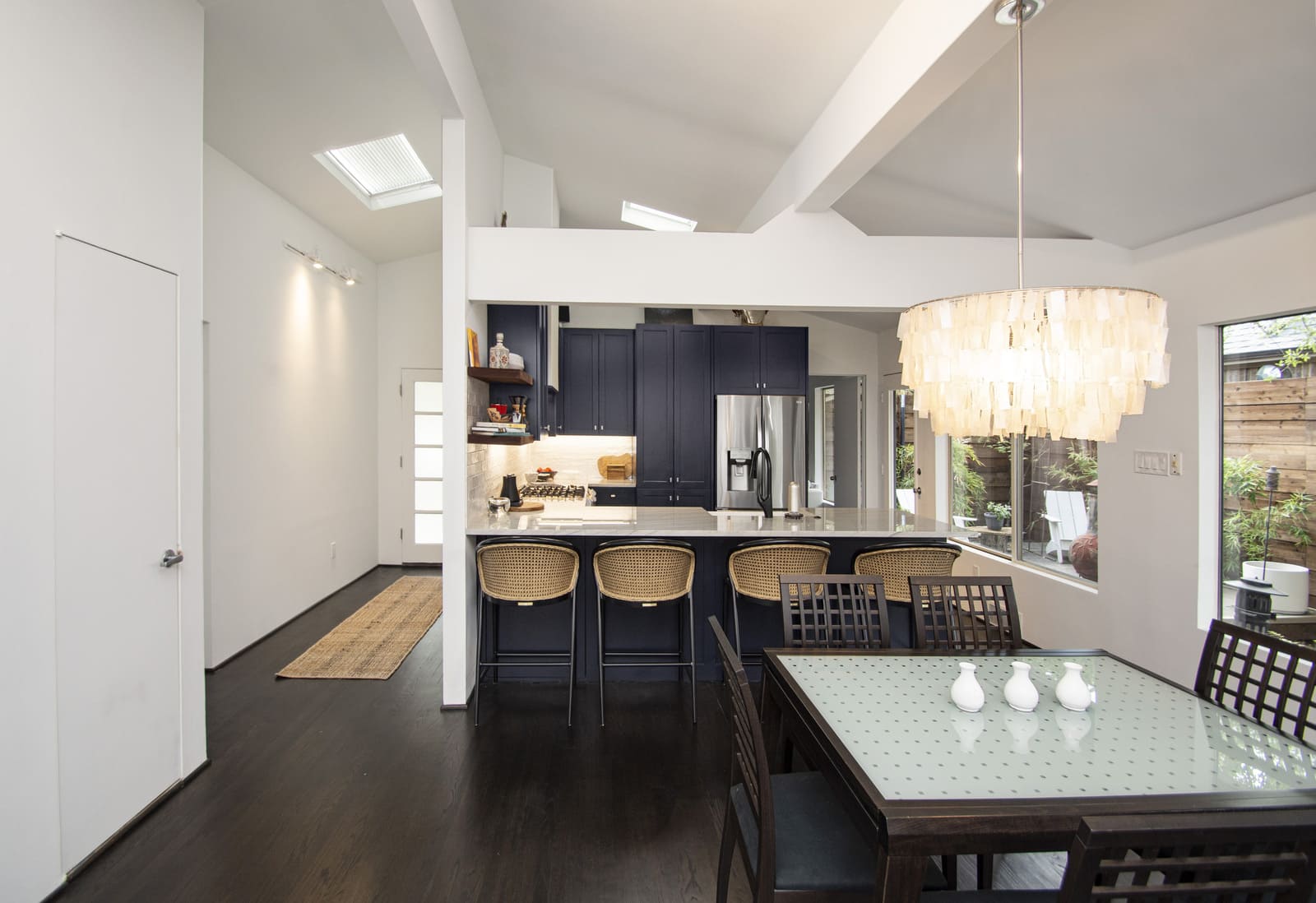 View of dining room and kitchen in Dallas, TX home remodel by Sardone | McLain