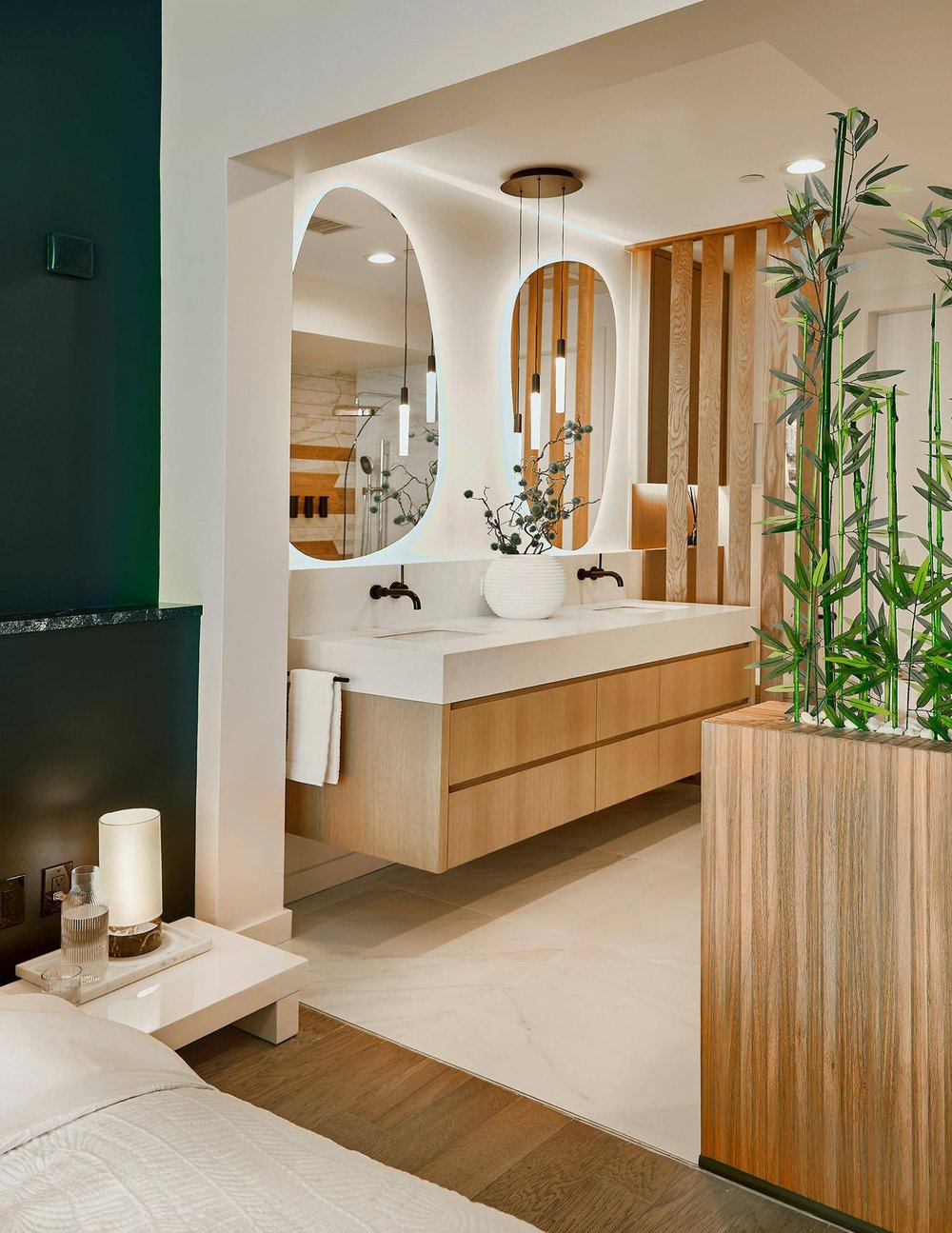 Dallas condo primary bathroom remodel with double wood vanity by Sardone | McLain