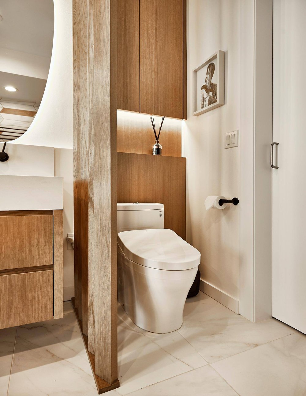 Dallas condo primary bathroom remodel with task lighting by Sardone | McLain