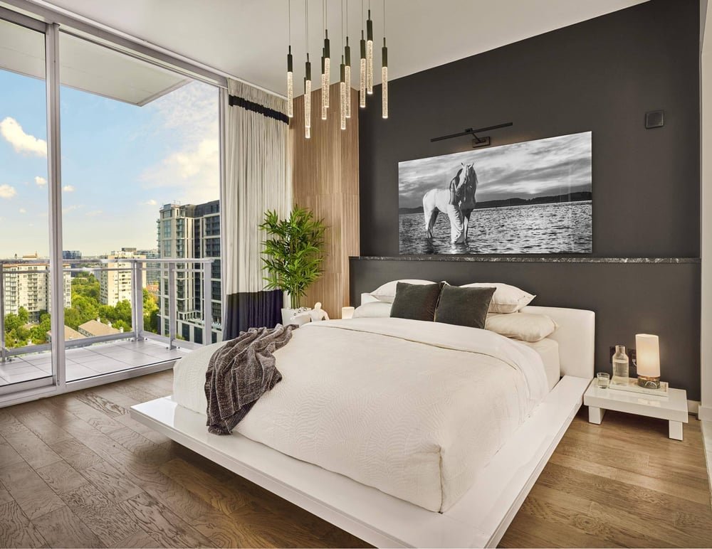 Dallas condo primary bedroom remodel with floor-to-ceiling window by Sardone | McLain