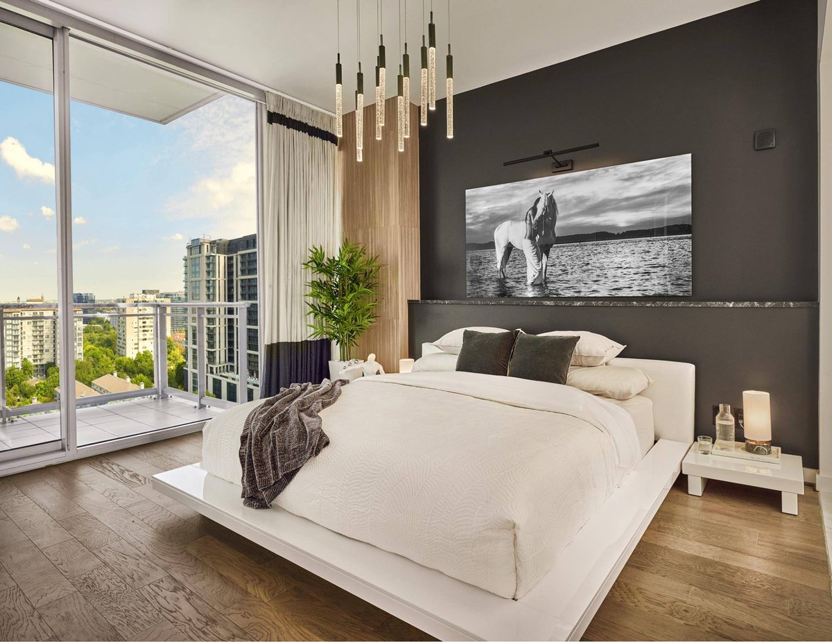 Dallas condo primary bedroom remodel with floor-to-ceiling window by Sardone | McLain