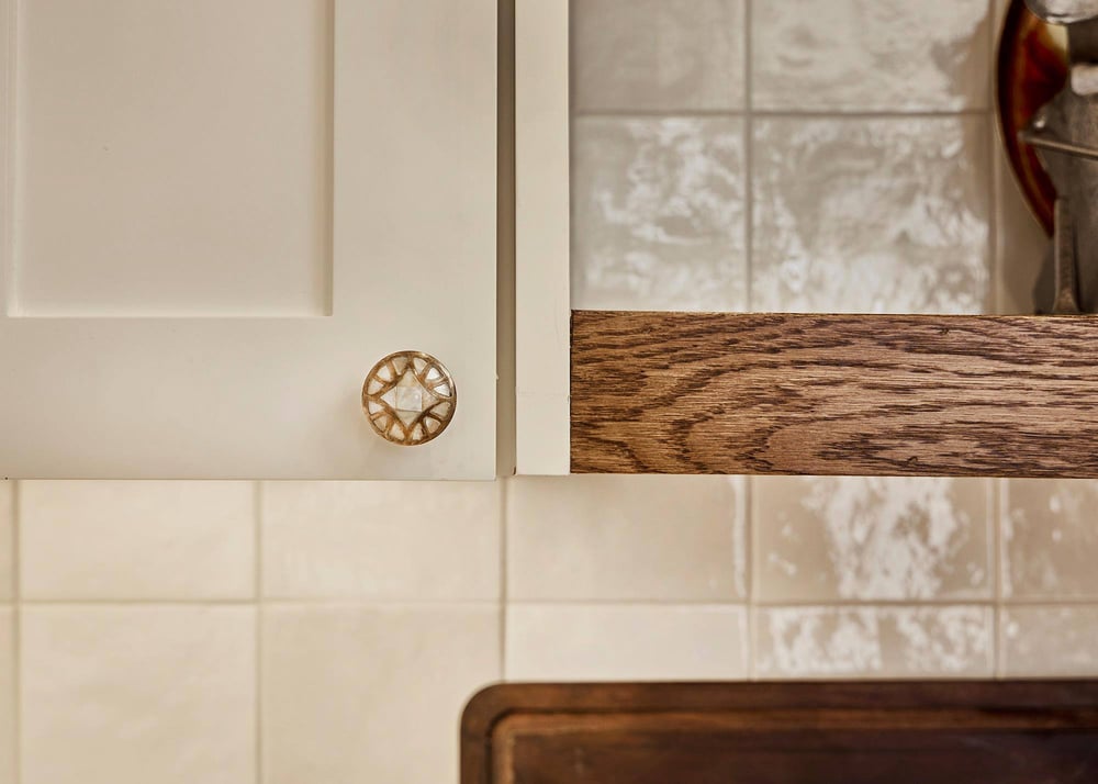 Kitchen remodel with knob pulls and square backsplash in Dallas, Texas by Sardone | McLain