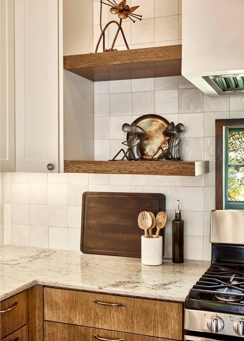 Two-tone kitchen with open shelving of Dallas townhome remodel by Sardone | McLain