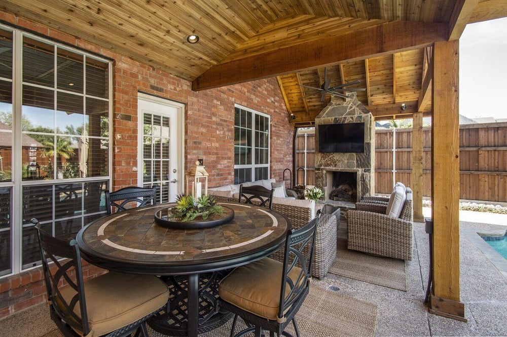 Dining table in outdoor living space remodel in Dallas by Sardone | McLain