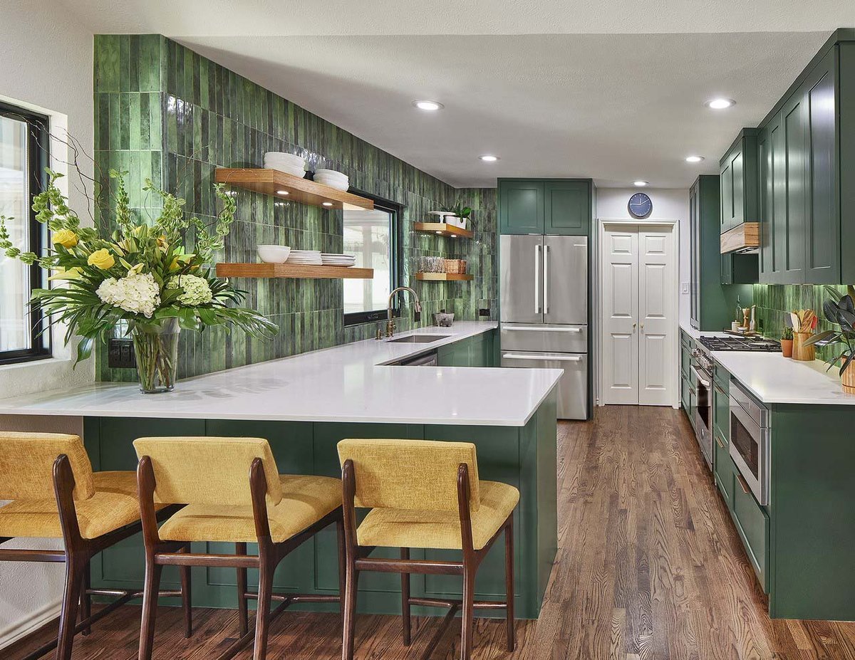 L-shaped modern green kitchen remodel with vertical subway tiling by Sardone | McLain