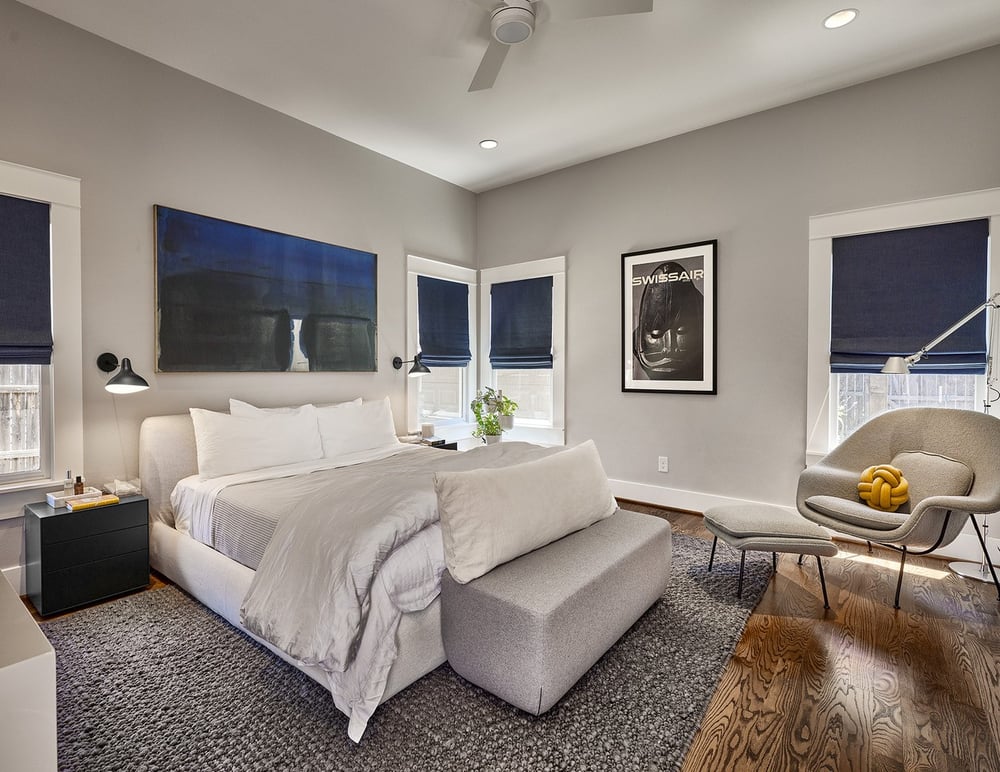 Primary bedroom renovation in Dallas, Texas by Sardone | McLain with three-blade ceiling fan above bed